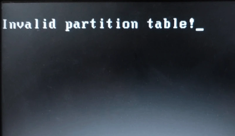 Сообщение Invalid Partition Table при загрузке